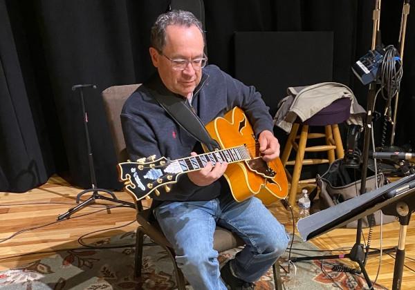 Dave Askren playing guitar